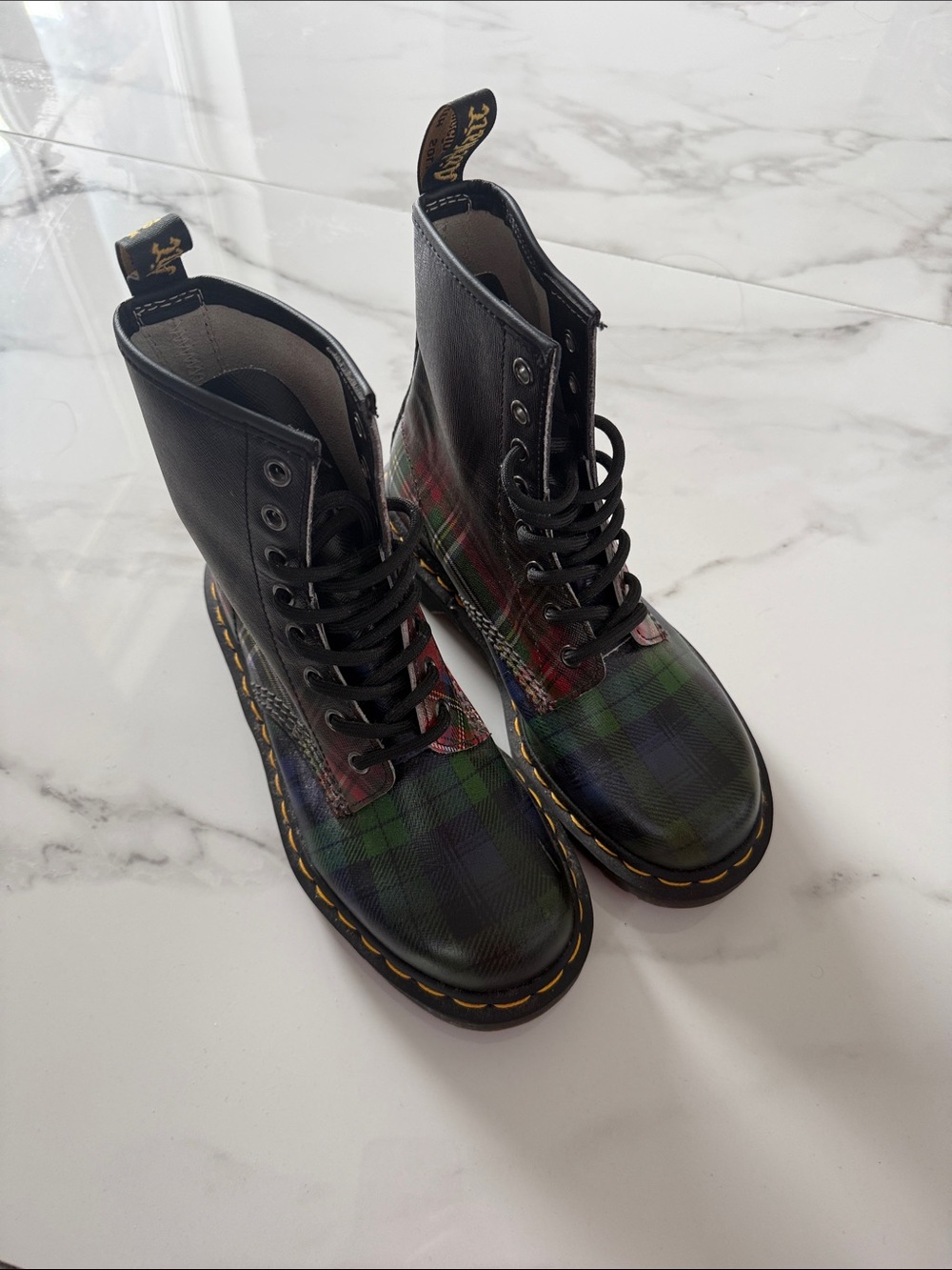 Dr. Martens 1460 Tartan leather boots featuring a red and green plaid